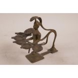 An Indian bronze figural oil lamp with five reservoirs, 4" high x 5" long