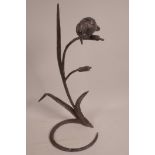A cast and wrought iron garden figurine of a kingfisher perched on a bulrush, 19" high