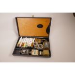 A vintage Bakelite artist's box and contents, 11" x 7" x 2"