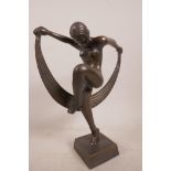 An Art Deco style bronze figurine of a dancer, 9½" high