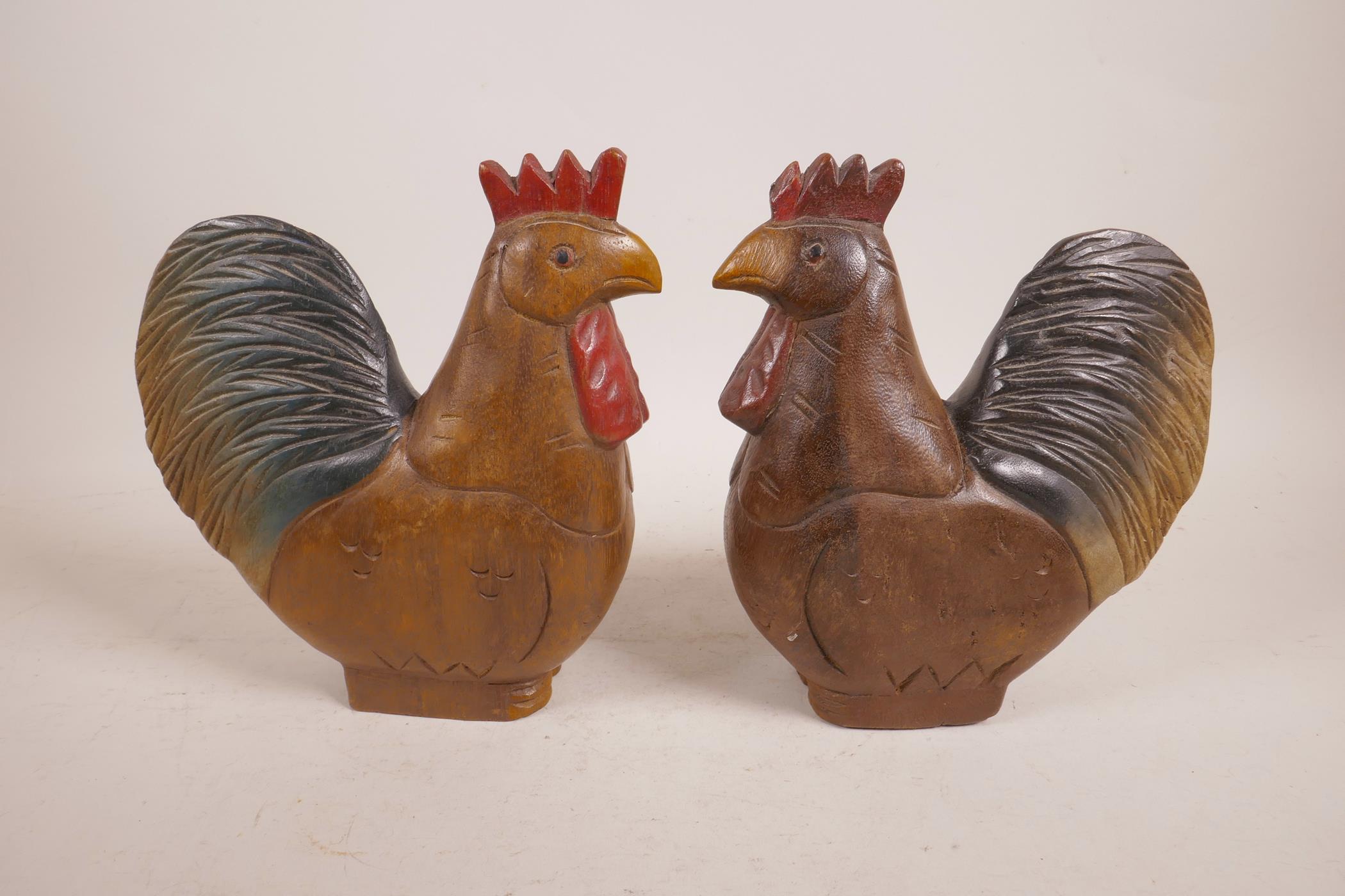 A pair of carved and painted wood cockerels, 8" high