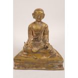 A Chinese bronze figurine of Buddha wearing a skullcap seated in meditation, possibly C18th, 7½"