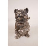 A silver plated vesta in the form of a bear smoking, 3" high x 2" wide