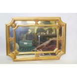 A contemporary gilt framed wall mirror, 37½" x 27½"