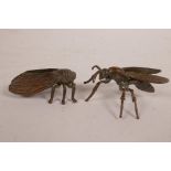 An Oriental bronzed copper figure of a cicada and another similar of a wasp, 2" long
