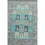 A Turkish rug with traditional four seasons design on a terracotta field, 60" x 42"