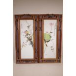 A pair of Chinese polychrome porcelain panels decorated with birds amongst flowers, and waterfowl on