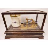 A Victorian barograph by Curry and Paxton, with nickel and brass fittings within a mahogany glazed