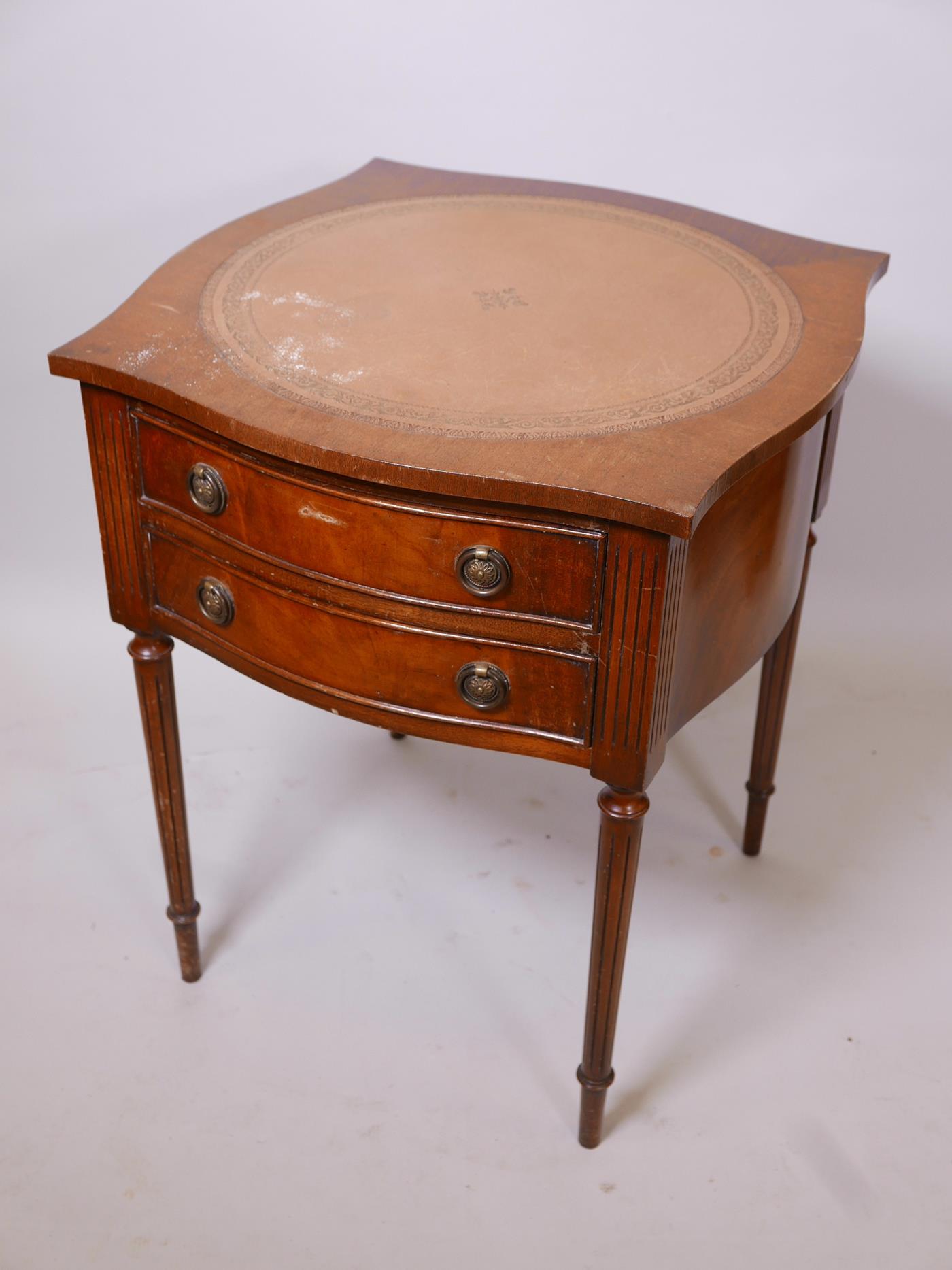 A mahogany shaped top table with two drawers, inset tooled leather top and fluted tapering supports, - Image 2 of 2