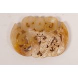 A Chinese carved jade pendant decorated with two phoenix, 2½" x 2"
