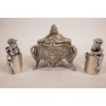 A small Chinese metal box and two silver plated Chinese seals, decorated with dragons and