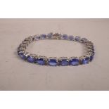 A 925 silver and kyanite tennis bracelet, 7½" long