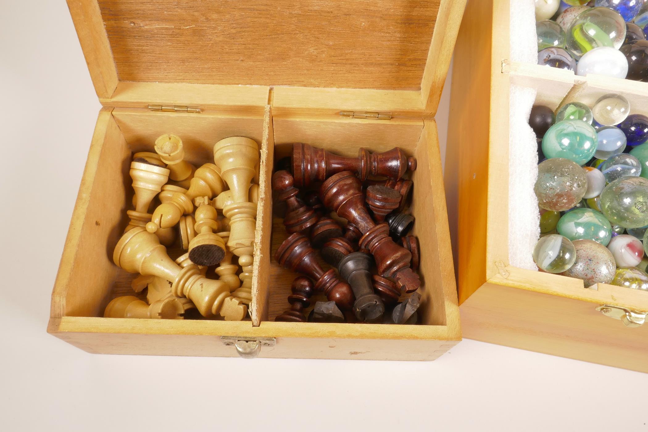 A box of vintage glass marbles together with a set of matched chess pieces and a table skittles game - Image 4 of 4