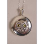 A 925 silver pendant locket with owl decoration, 1" diameter