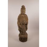 A Chinese carved wood figure of Buddha, 22½" high