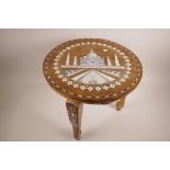 An Oriental hardwood occasional table with bone inlay decoration depicting the Taj Mahal, 15" high x