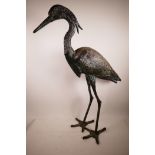 A metal garden figure of a heron, 33½" high