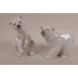 Two Lladro polar bear figurines; 'Resting Polar Bear' and 'Attentive Polar Bear', stamped to base