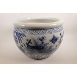 A Chinese blue and white pottery jardiniere decorated with carp in a lotus pond, 10" high x 15"