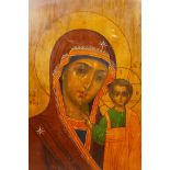 Two Orthodox icons of the Madonna and Child, one oil on panel, the other enamel, largest 8½" x