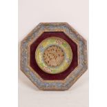 A carved jade and enamel cloisonné plate, mounted on a hexagonal frame, lined with red velvet, 7"