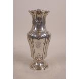 A white metal vase with raised swag and scroll decoration, total weight 258 grams
