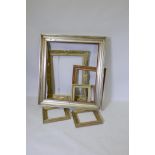 A quantity of gilt picture frames, including a swept gilt frame, rebate 18" x 24"