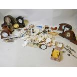 A quantity of horologist's tools and accessories including keys, screws, springs, an escapement