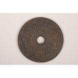 A Chinese hardstone pi disc with carved archaic decoration, 6" diameter