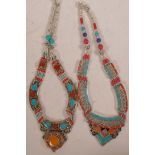 Two Tibetan white metal and stone set necklaces, 19" long
