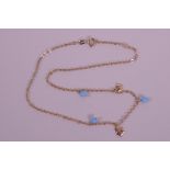 A child's 18ct gold and turquoise necklace, 14" long (gross 4.6 grams)