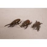 Three Japanese Jizai style bronzed copper beetle okimonos, impressed marks to bases, longest 3"
