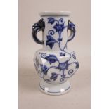 A Chinese blue and white porcelain two handled vase, 6 character mark to base, 7" high