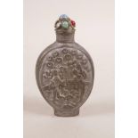 A Chinese metal snuff bottle with raised figural decoration, impressed four character mark to