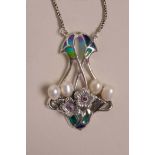 A silver and plique-à-jour, Art Nouveau style pendant necklace, 2" drop