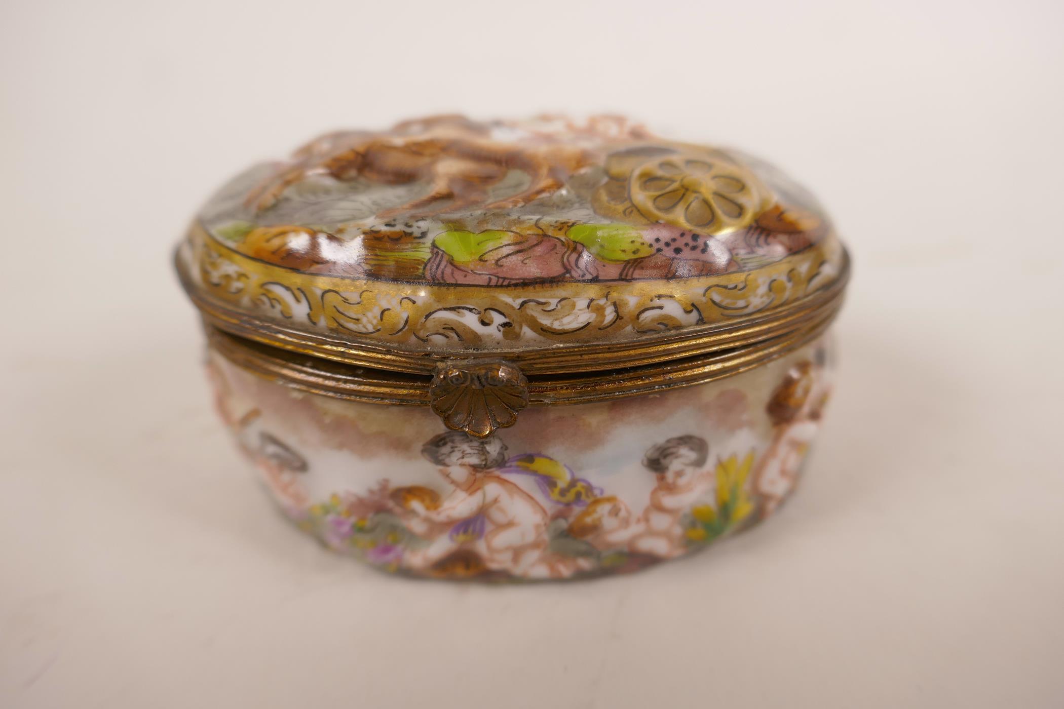 Two C19th enamel patch boxes, and a large enamelled Naples box decorated with cherubs and a Roman - Image 2 of 6