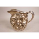A silver plated Reed and Barton 'Sunny Jim' double faced smiling Toby pitcher, signed to base and