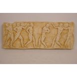 A plaster wall plaque, decorated with classical figures, 15" x 6"