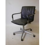 A chromed steel and brushed aluminium swivel office chair with leather upholstery, late C20th