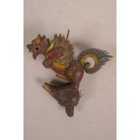 A Balinese carved and painted wood bottle pourer, in the form of the Garuda, A/F, 7" high