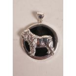 A sterling silver and black enamel pendant with bulldog decoration, 1½" diameter