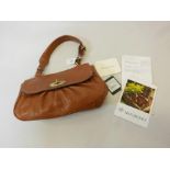 A Mulberry 'Joelle' oak coloured leather shoulder bag, with original purchase receipt