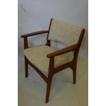 A 1960s teak office elbow chair