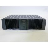 A Rotel RMB 1066 6X60W power amplifier, 17" x 16"