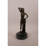 After Luis Noee, a bronze figure of a young woman, mounted on a marble base, 11" high