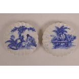 A pair of Chinese blue and white porcelain petal shaped saucers decorated with women of leisure in a