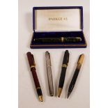 Five vintage pens, including a Mont Blanc biro, two Parker fountain pens, a Parker retractable