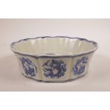 A Chinese blue and white porcelain steep sided dish, with dragon decoration, 6 character mark to
