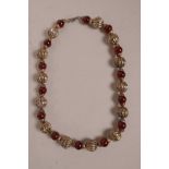 A white metal and agate beaded necklace, 18" long