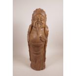 A Chinese carved bamboo figure of a jolly sage, 19" high